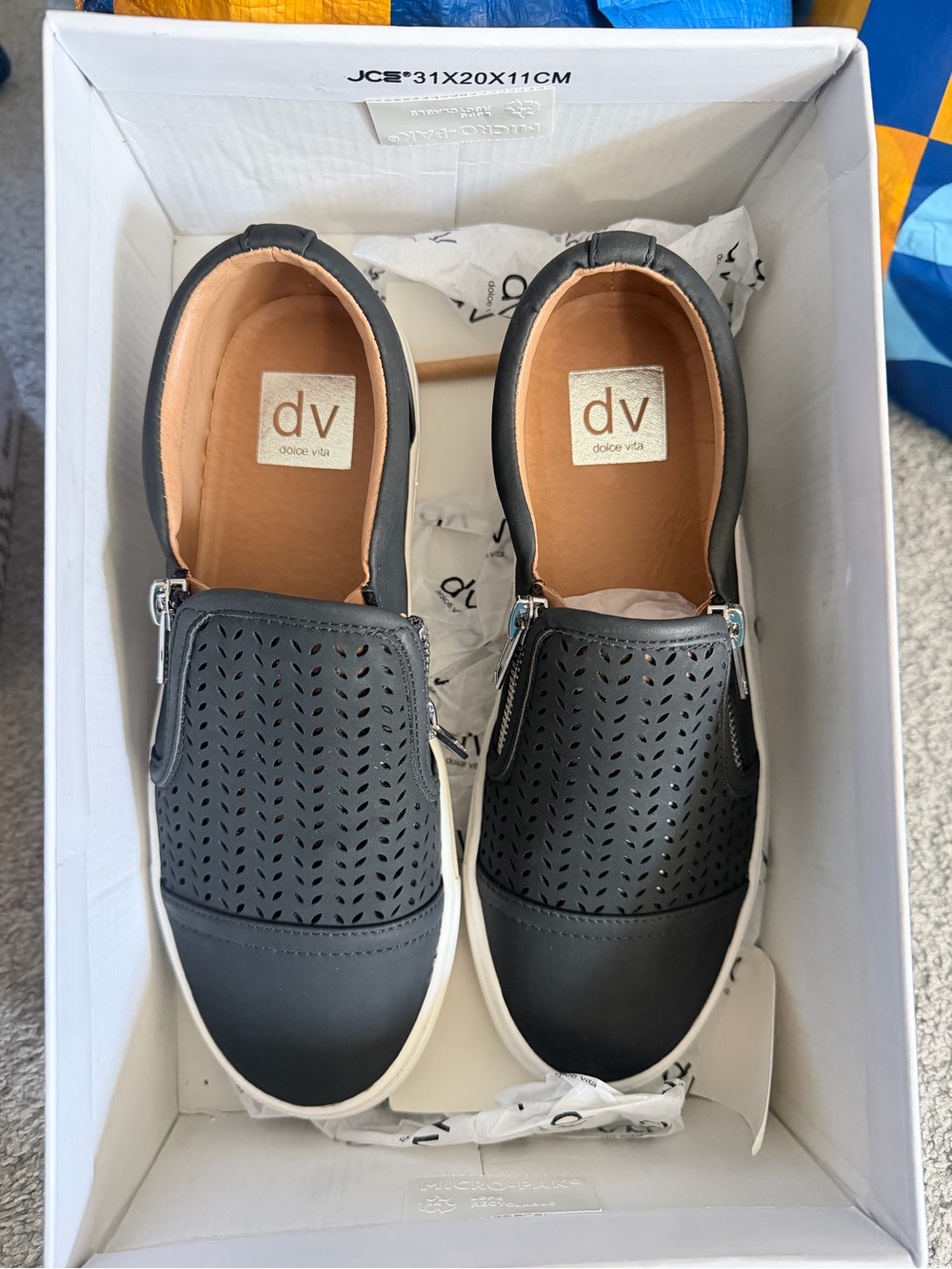 Dolce Vita Black and Tan Leather Slip-On Shoe